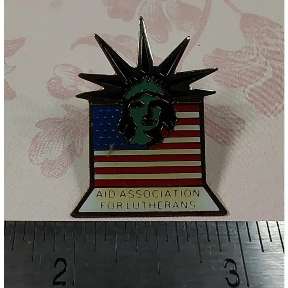 Aid Association for Lutherans 1983 Signed Statue of Liberty American Flag Pin